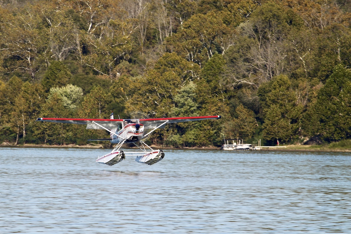 N19D Cessna 185 conducting seaplane training in Kentucky on the Ohio River